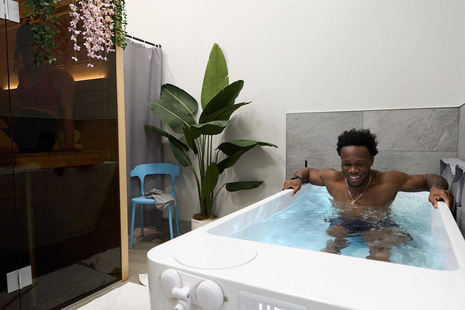 Photo 2: cold plunge Guest in the cold plunge at LIVE Hydration Spa Long Island City
